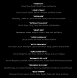 OLPHACTORY CANDLES. The Miles from The Quartet Discovery Collection. Four 4oz. Matte Black Tins in the Tribal print design tube. Front view.